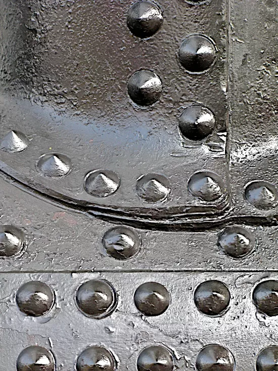 Closeup of old iron plates and rivets