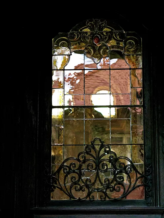 Reflections in a tall window