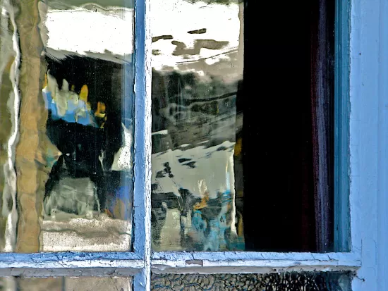 Reflections in wavy glass