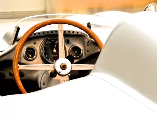 Wood steering wheel and dashboard on an old race car